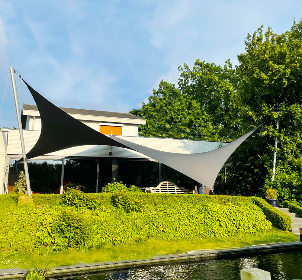 Groot-zeildoek-terras-op-maat-verwijderbaar-stormvast-brunssum-manta-roofs-overkapping-waterdicht-04 - Manta Roofs