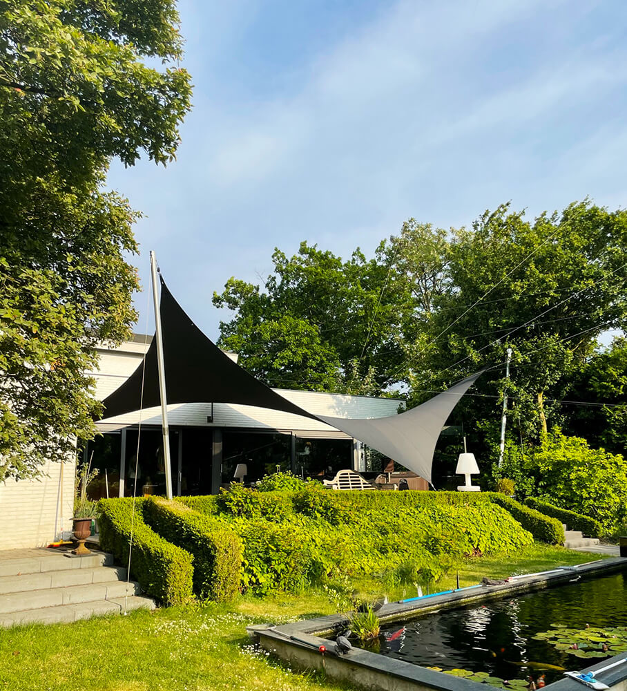 Groot-zeildoek-terras-op-maat-verwijderbaar-stormvast-brunssum-manta-roofs-overkapping-waterdicht-10 - Manta Roofs