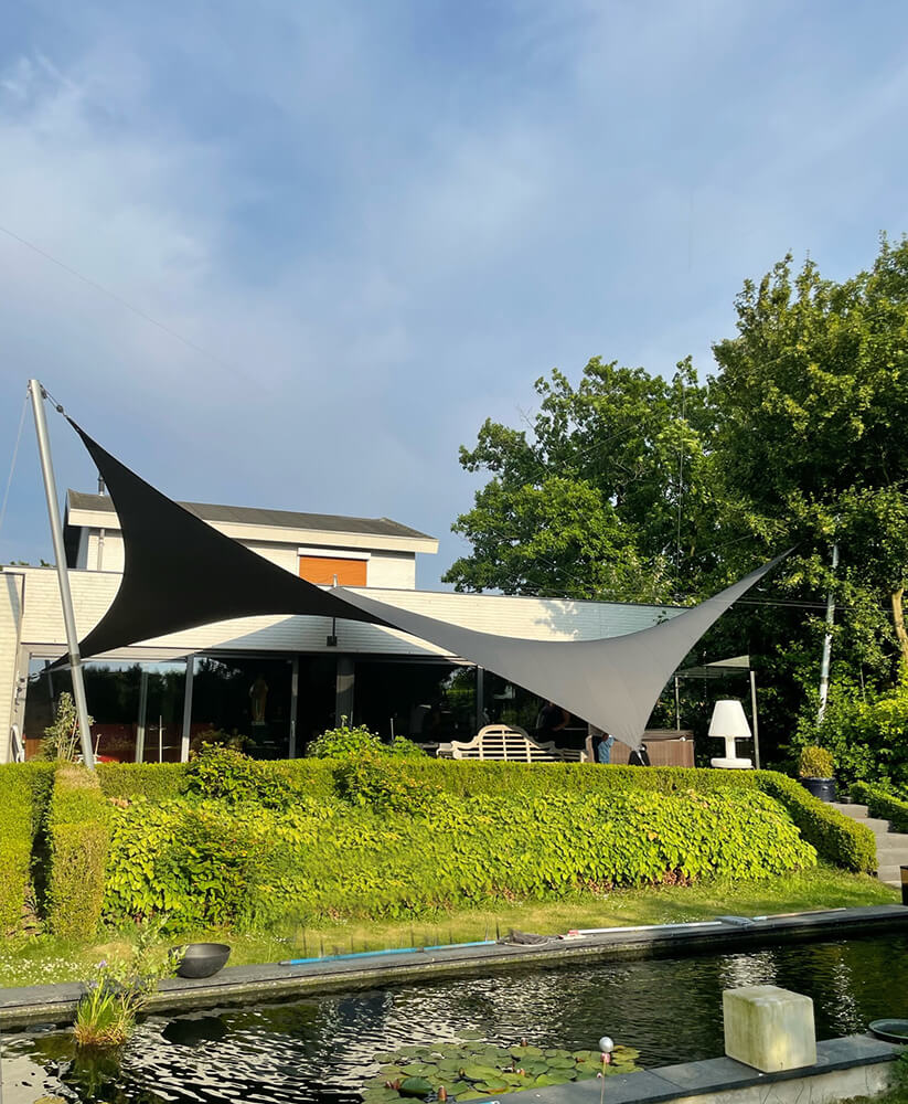 Groot-zeildoek-terras-op-maat-verwijderbaar-stormvast-brunssum-manta-roofs-overkapping-waterdicht-11 - Manta Roofs